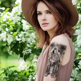 Faux tatouage loup et forêt