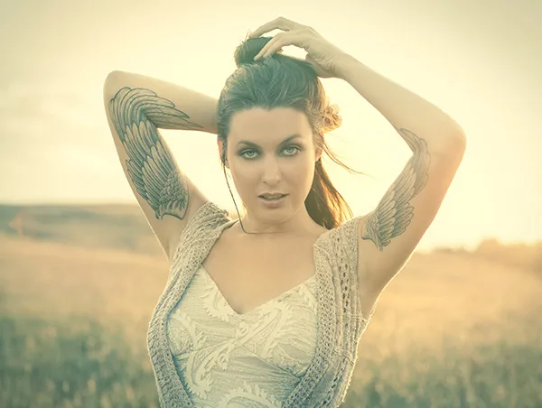 tatouage femme ailes