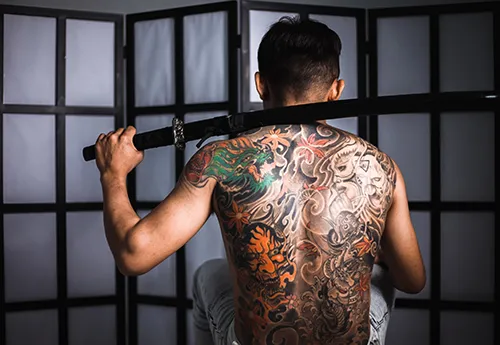 tatouage dos complet homme