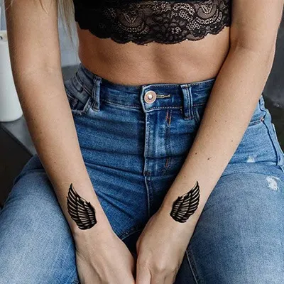 tatouage liberté ailes