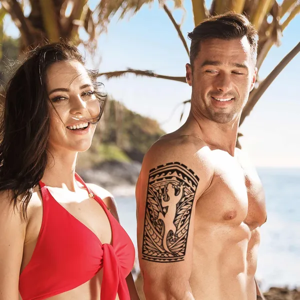 Tatouage maori bras salamandre