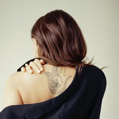 tatouage protection main de fatma hamsa