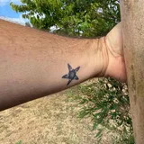 Tatouage étoile de mer maori homme femme