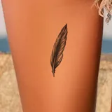 Tattoo éphémère femme plumes noires